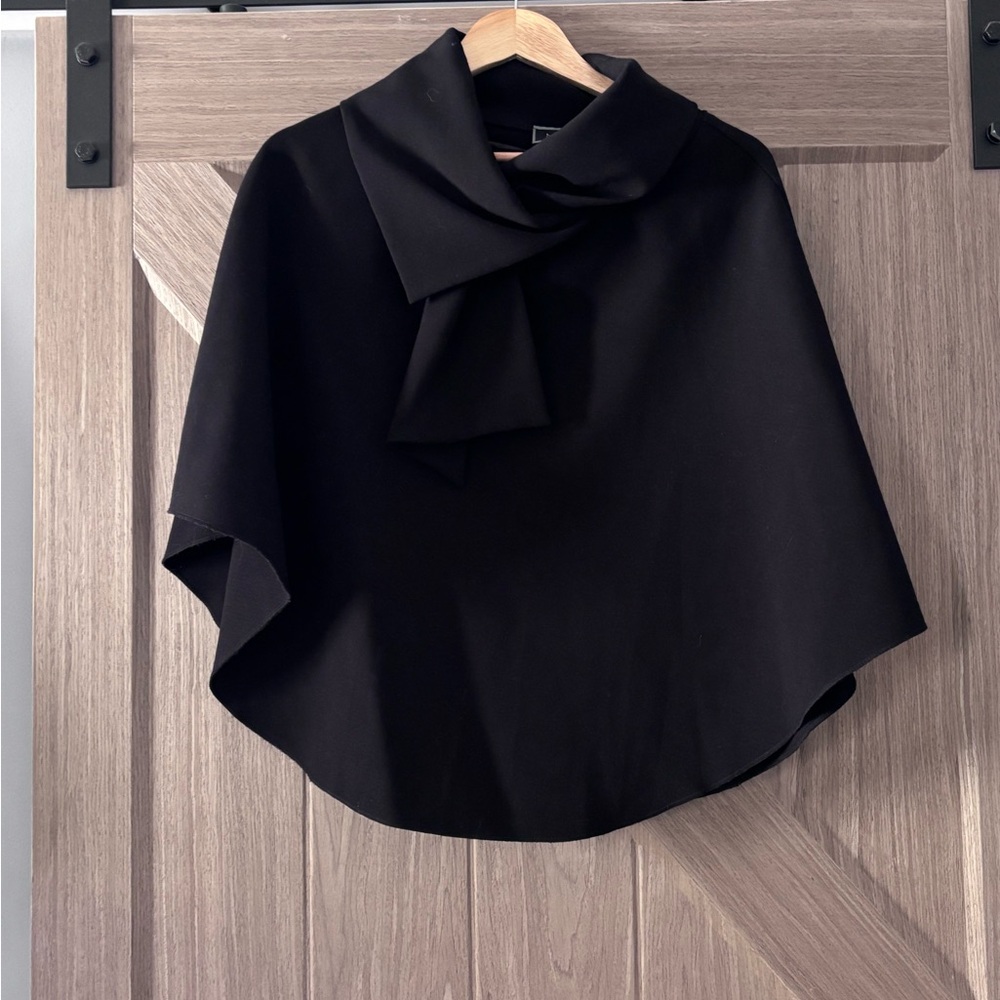 Le Chateau Black Garment with Stylish Detail